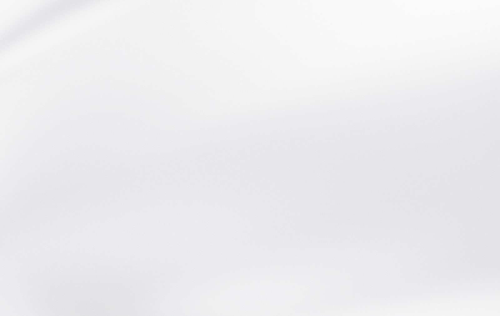 Abstract white textured background with soft gradients.