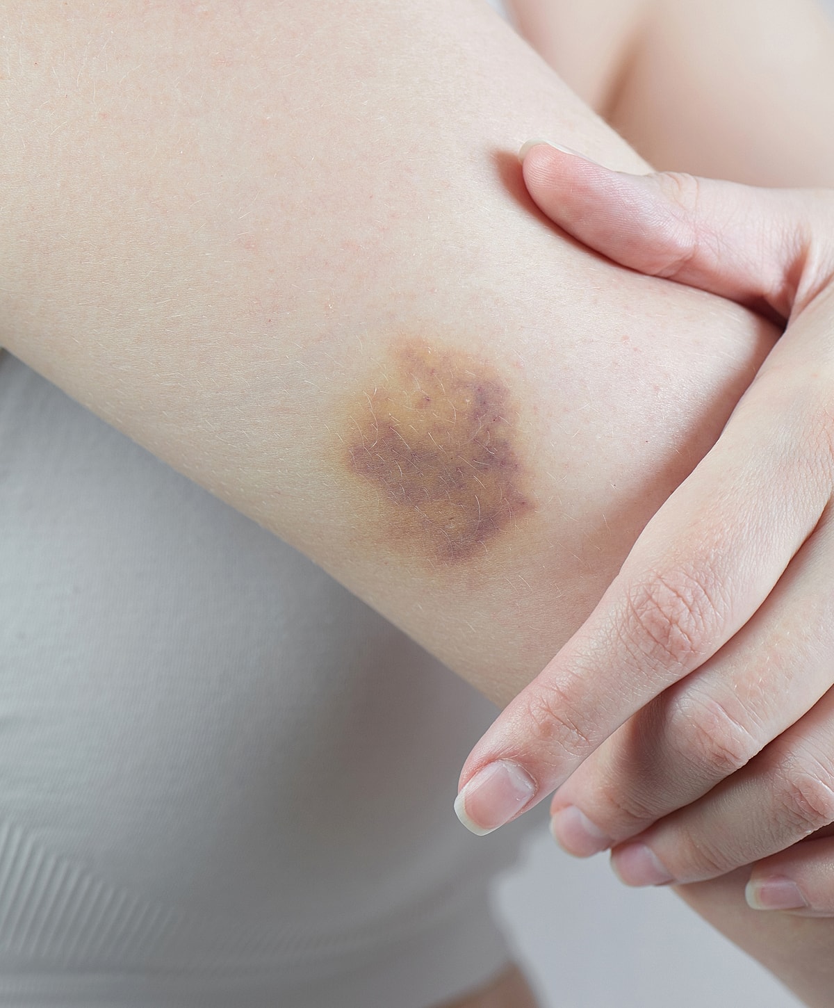 Medical professional preparing patient for procedure.