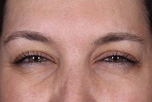 Close-up of person's eyes and eyebrows.