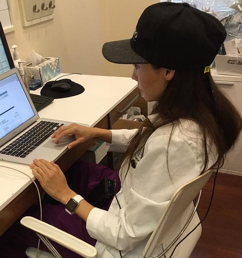 Administering lip filler treatment to a client