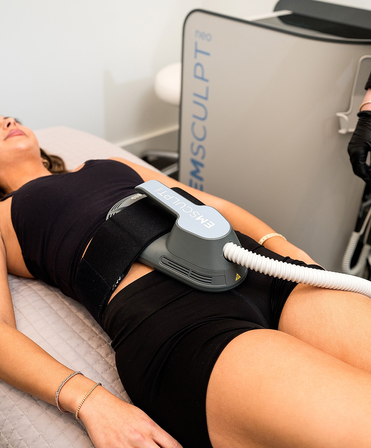 Medical professional preparing patient for procedure.