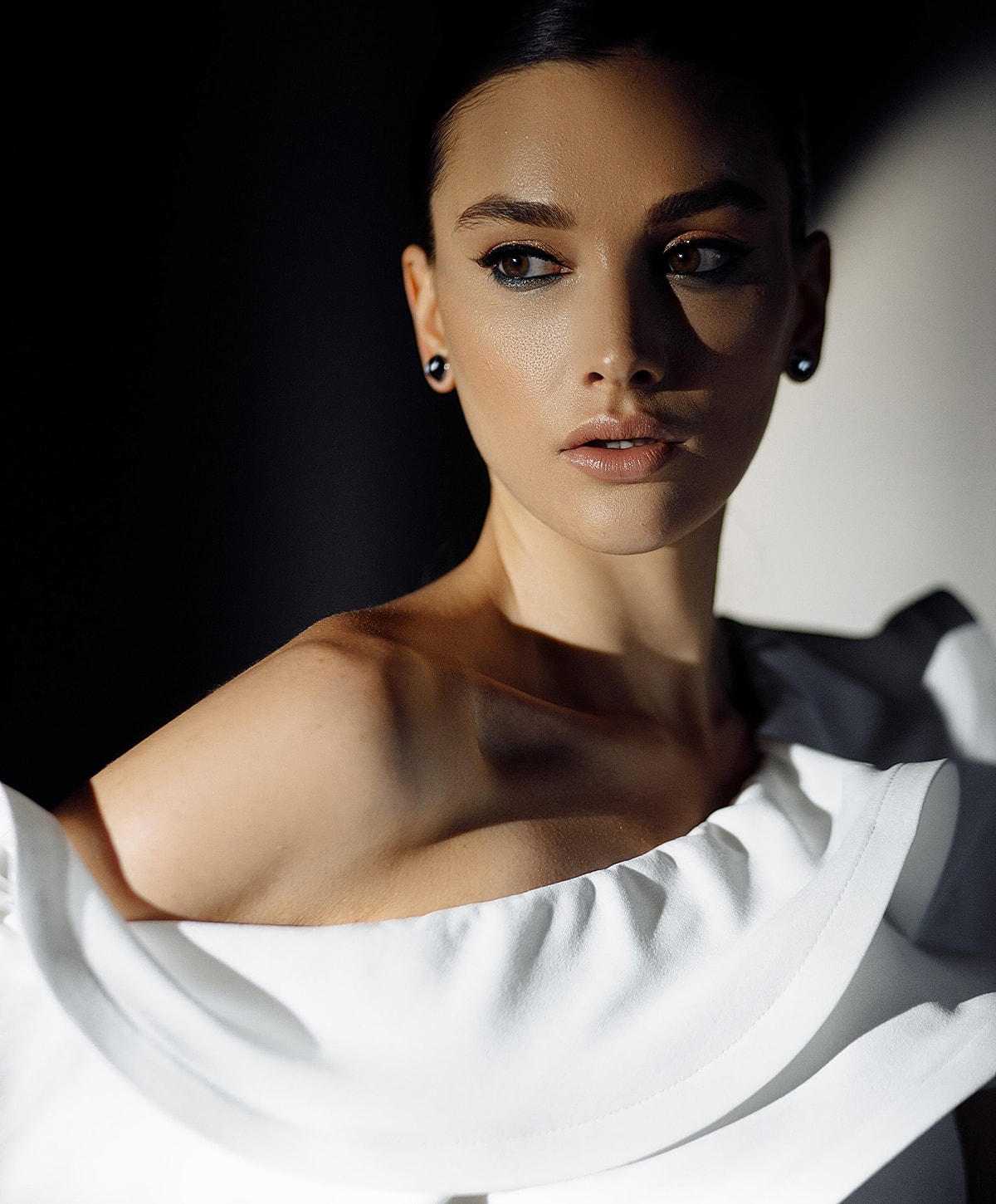 Medical professional preparing patient for procedure.