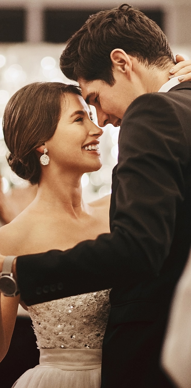 Couple embracing during a romantic dance.