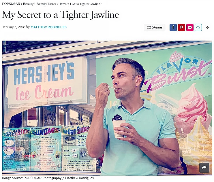 Man enjoying ice cream in front of shop.