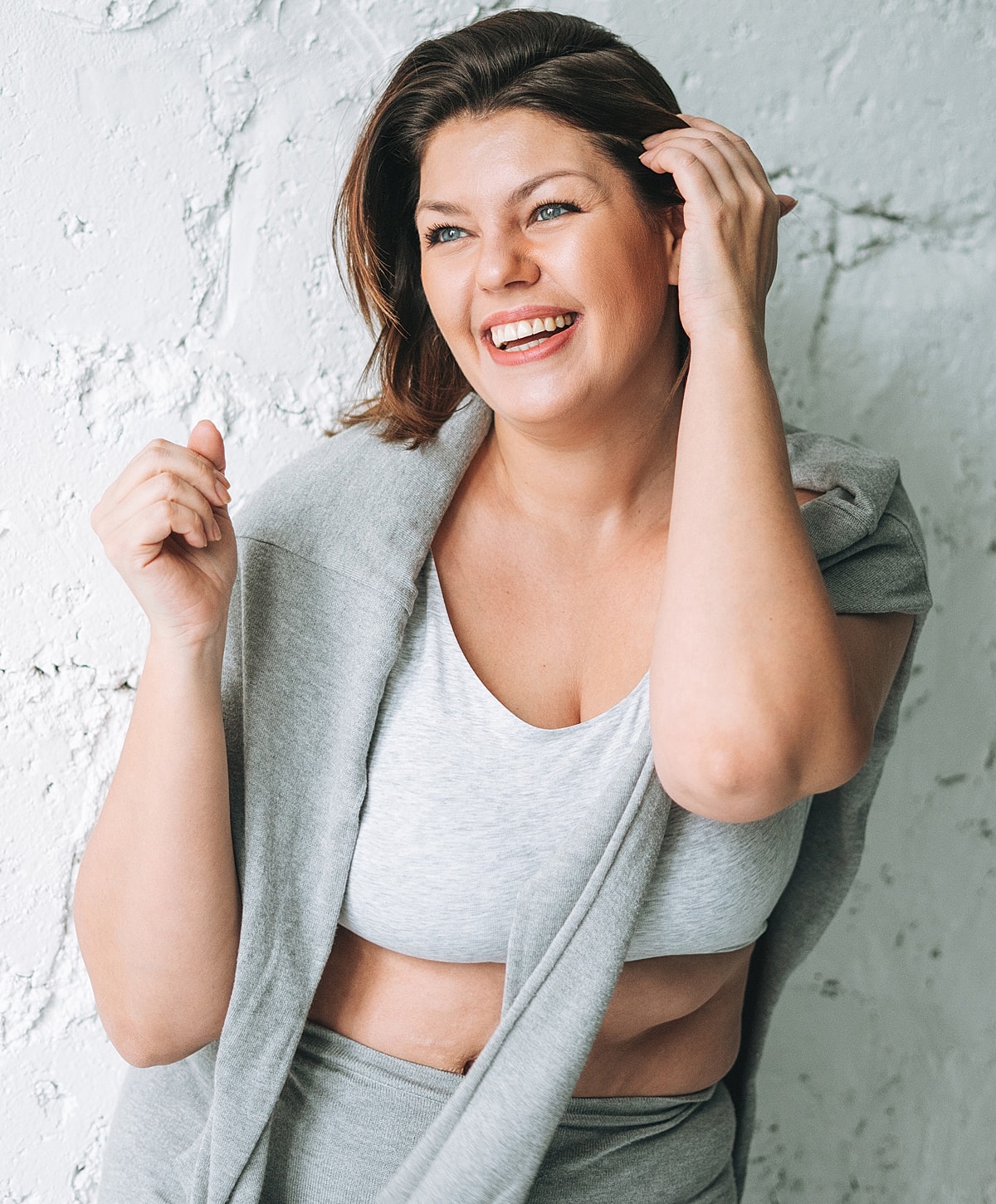 Black and white portrait of a woman in shirt.