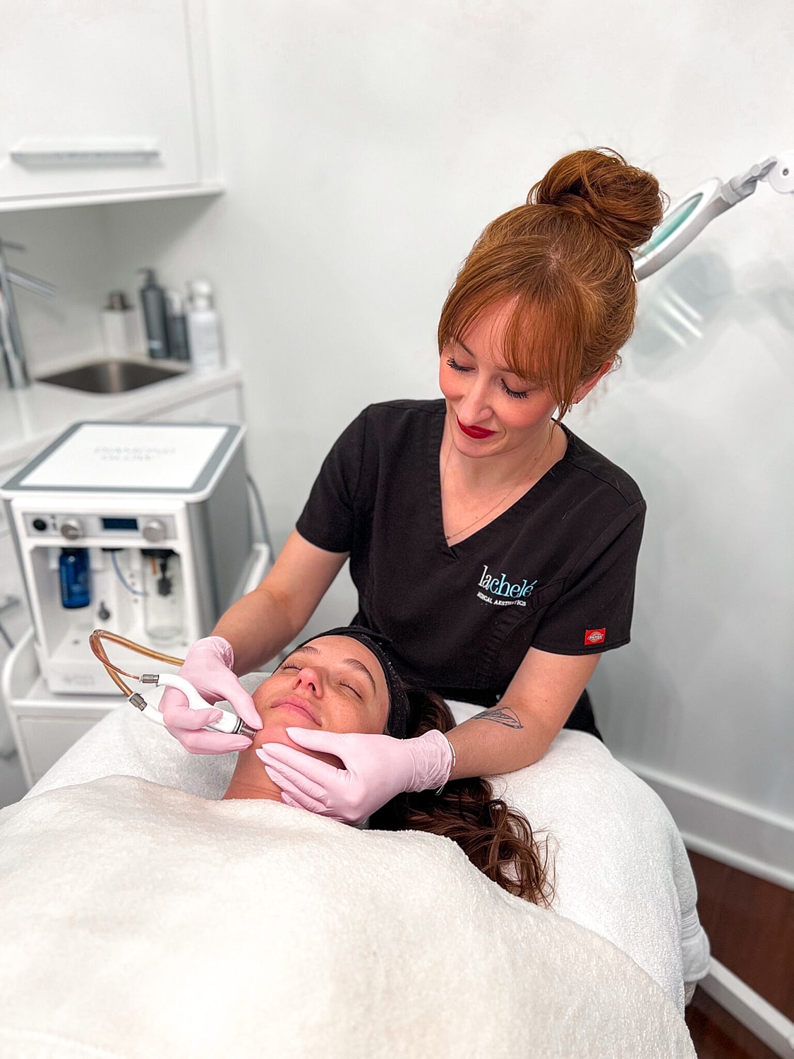 Facial treatment in a skincare clinic setting.