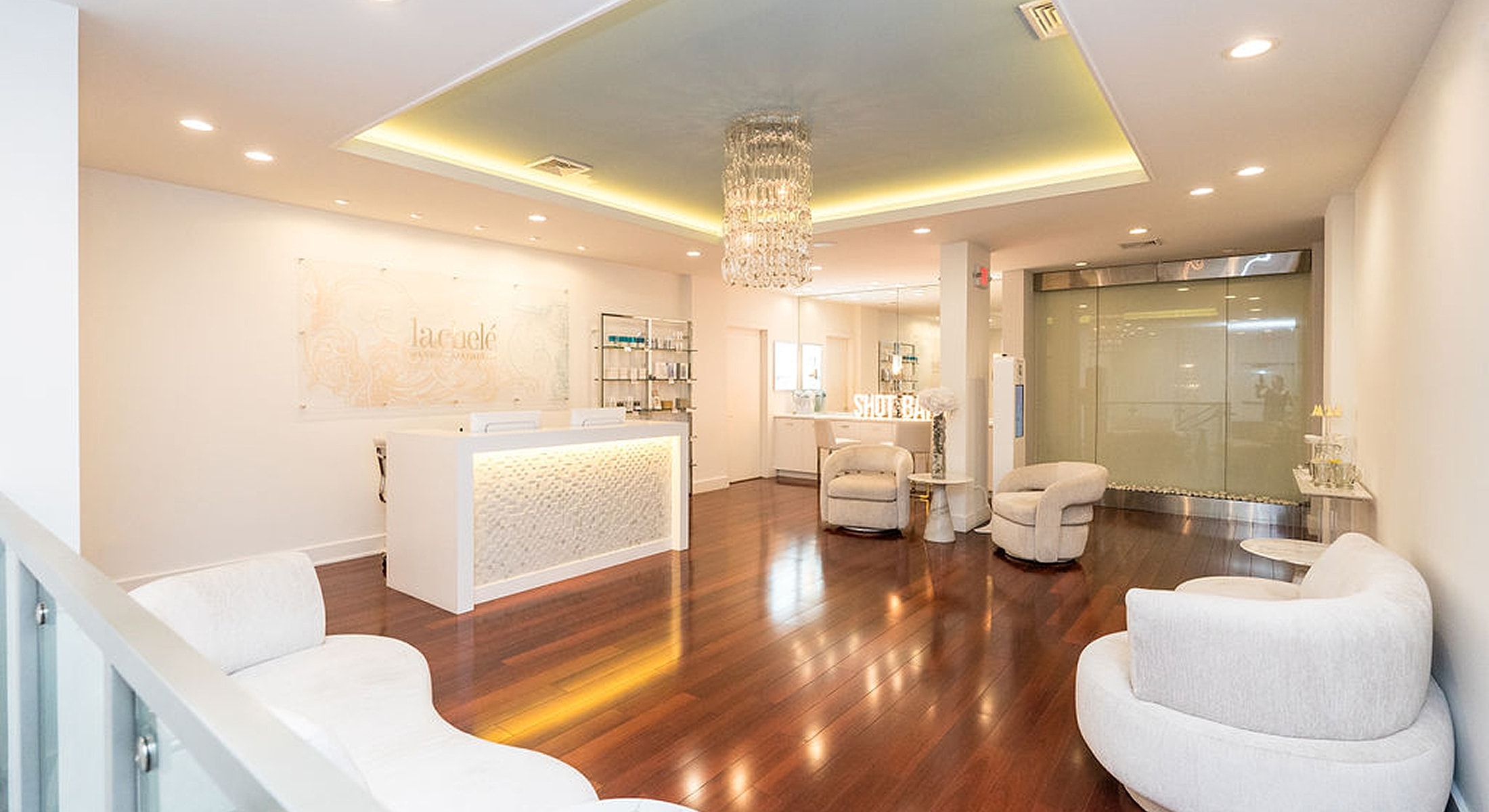 Luxury spa reception area with modern furnishings.