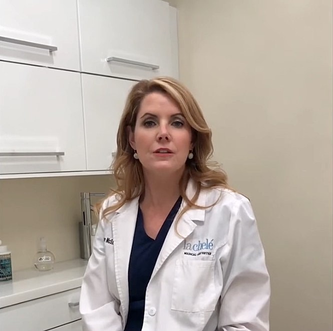 Healthcare professional in a clinical setting.