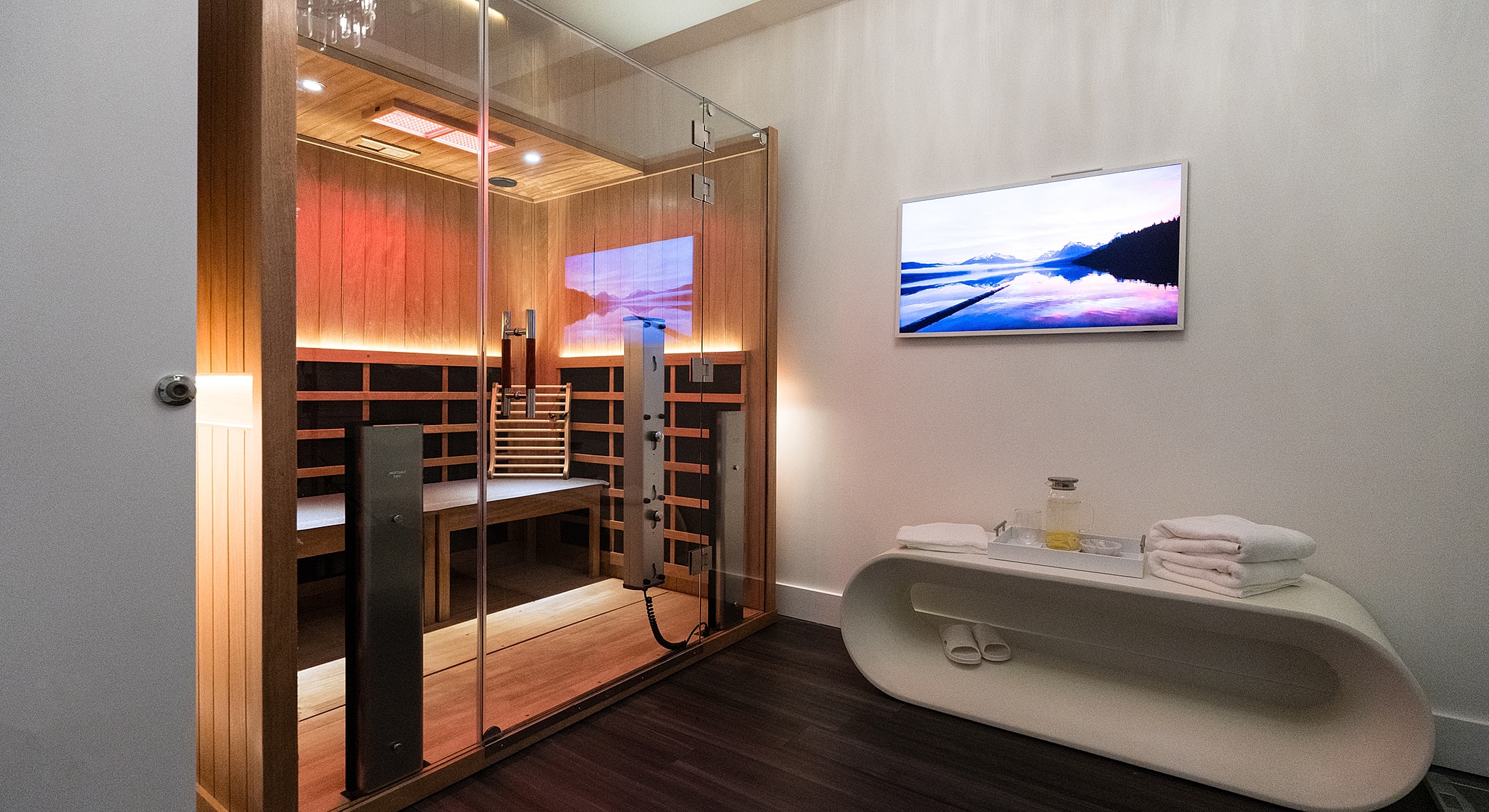 Modern sauna with relaxing lighting and amenities.