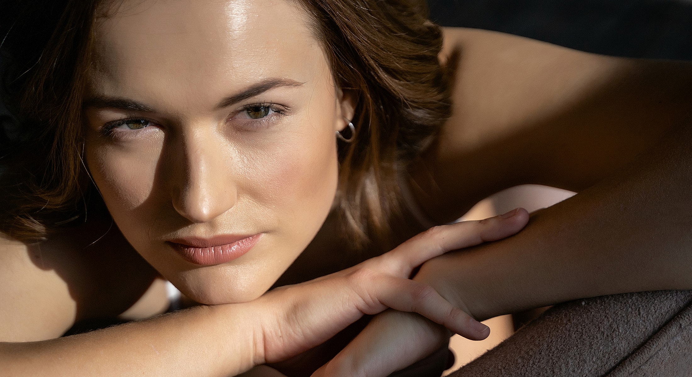 Microneedling treatment in progress on client's forehead.